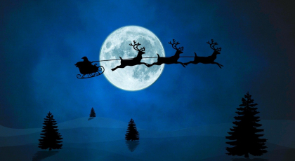 santa riding in a sleigh
